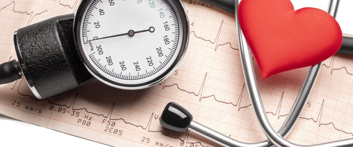 Cardiogram chart with red heart and stethoscope